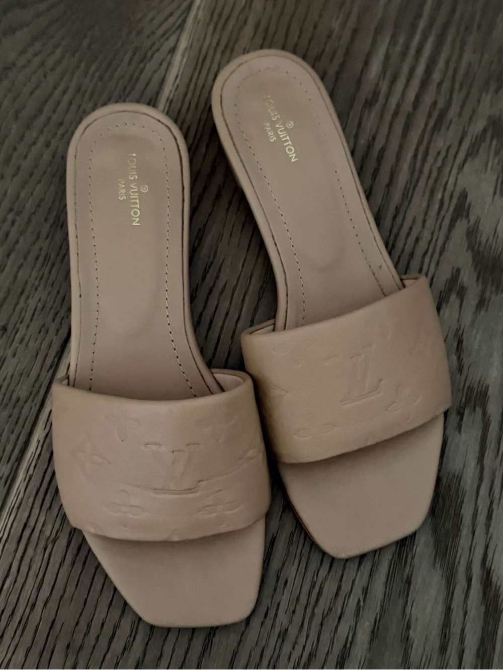 Louis Vuitton Beige Embossed Monogram Slides